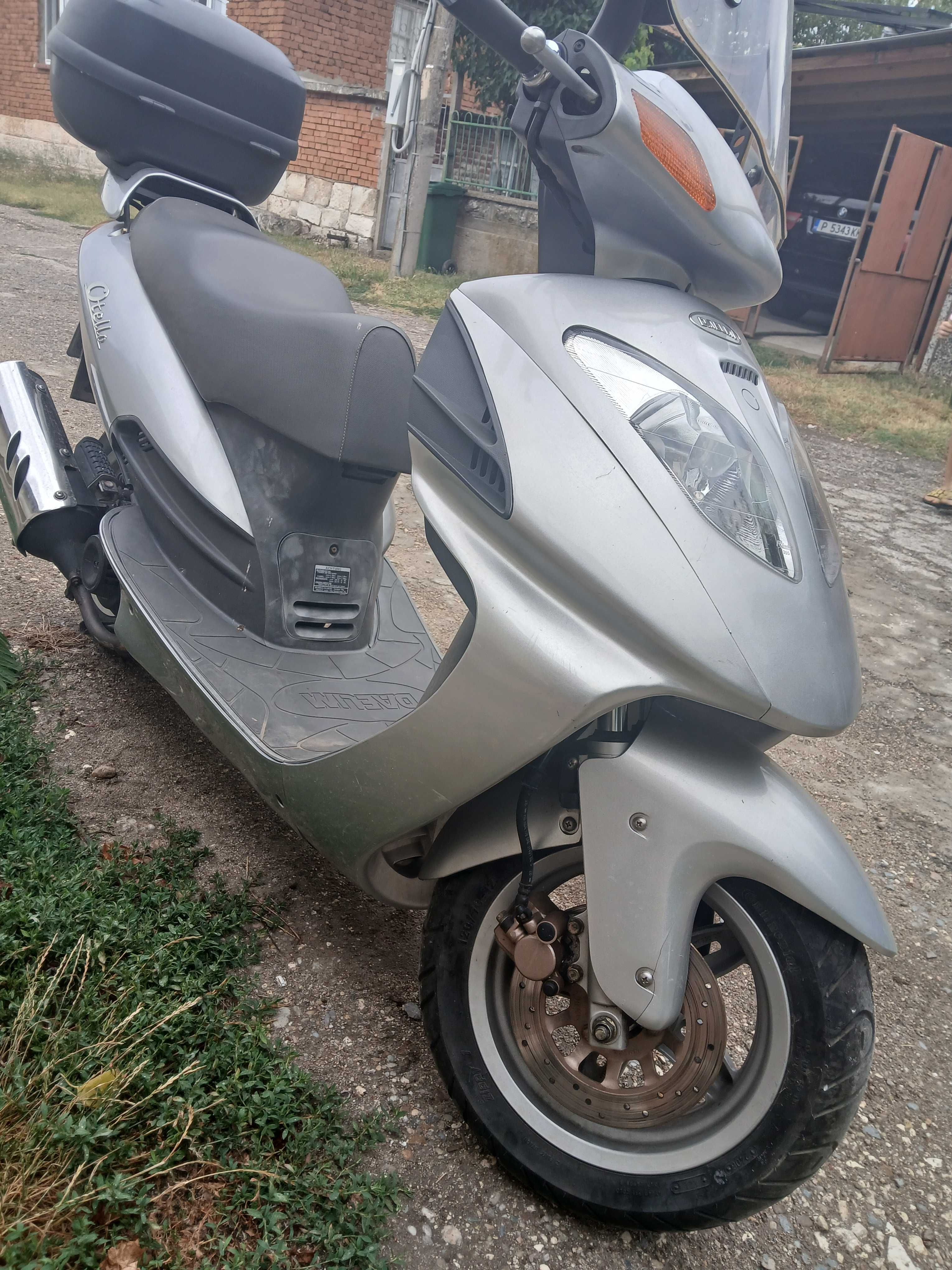 Скутер 125 кубика