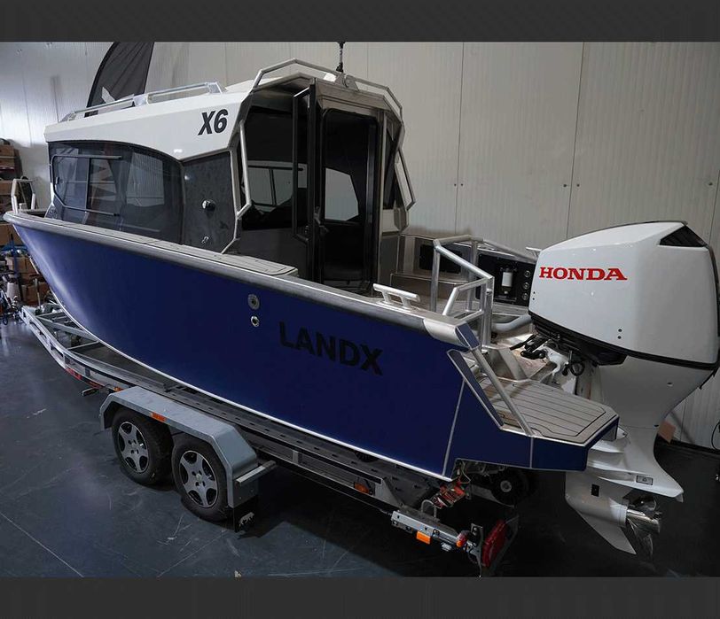 Barca aluminiu cabinata LANDX X6 cu motor Honda 150hp si peridoc