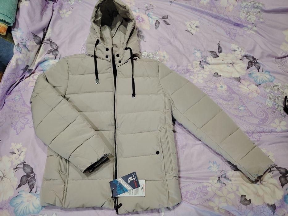 Продам новую мужскую куртку