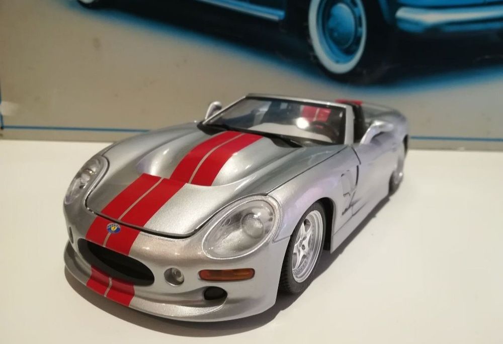 Shelby series1, anul1999 bburago 
Scara 1:18
Bburago

Pozele fac parte