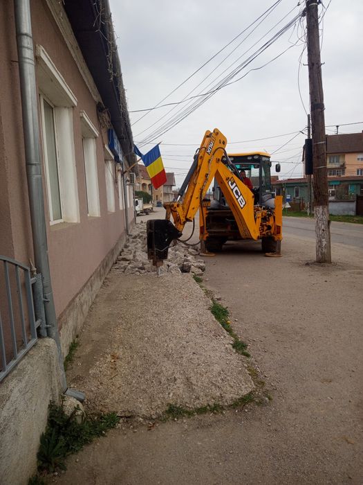buldoexcavator de închiriat zona Marghita -Oradea