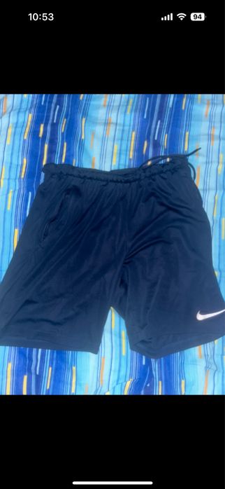 Doua perechi de pantaloni nike