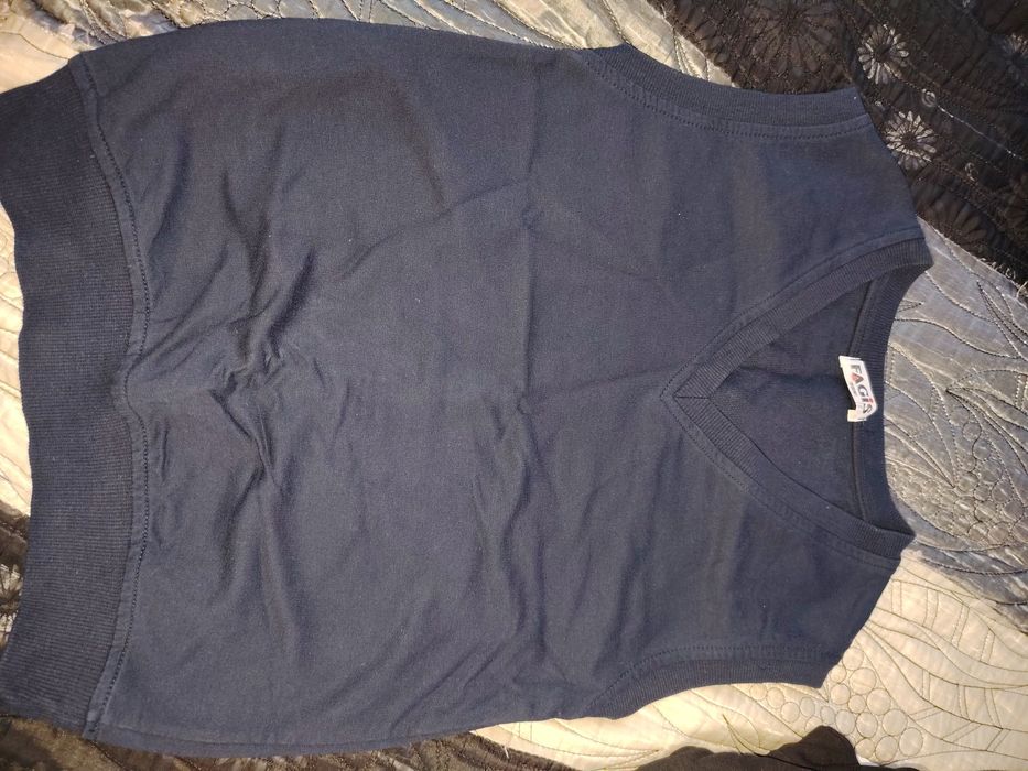 Школьные жилетки.