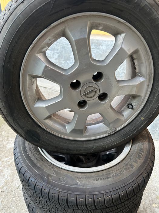 Vând set jante aliaj + cauciucuri iarnă Opel Astra 195/65/R15 DOT 2624