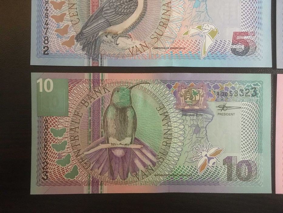 Комплект Банкноти Суринамски Гулден (2000 г.) - номинал 5, 10, 25, 100
