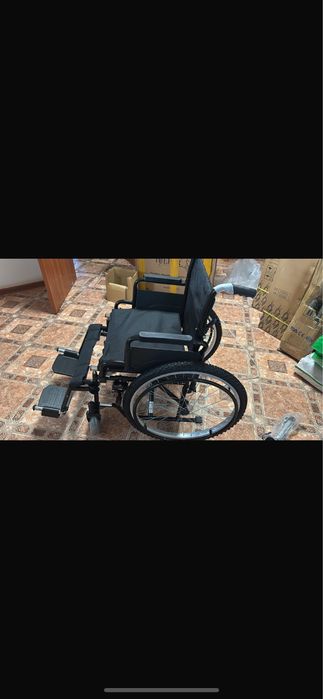 Новая инвалидная коляска