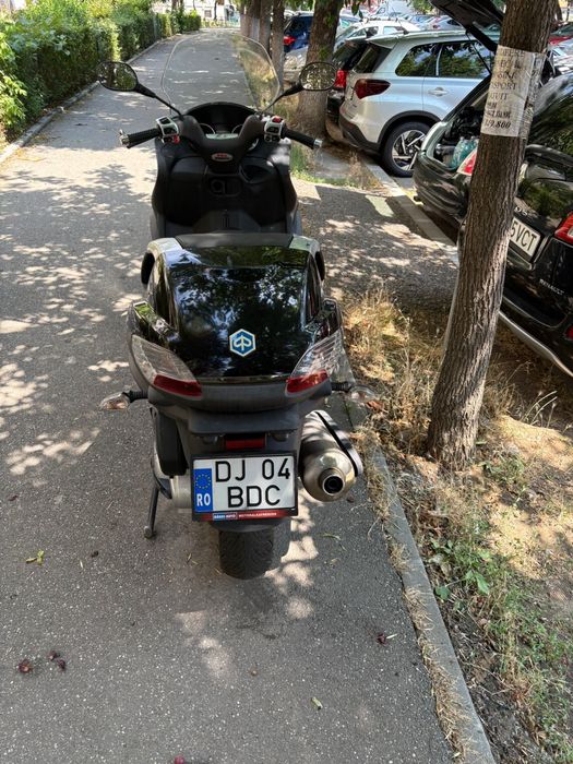 Piaggio mp3 400, se conduce cu categoria B