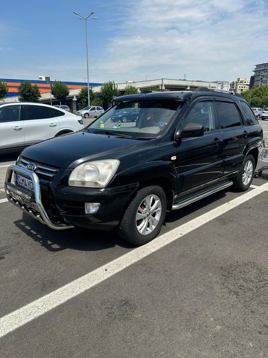 Vând Kia sportange 2005