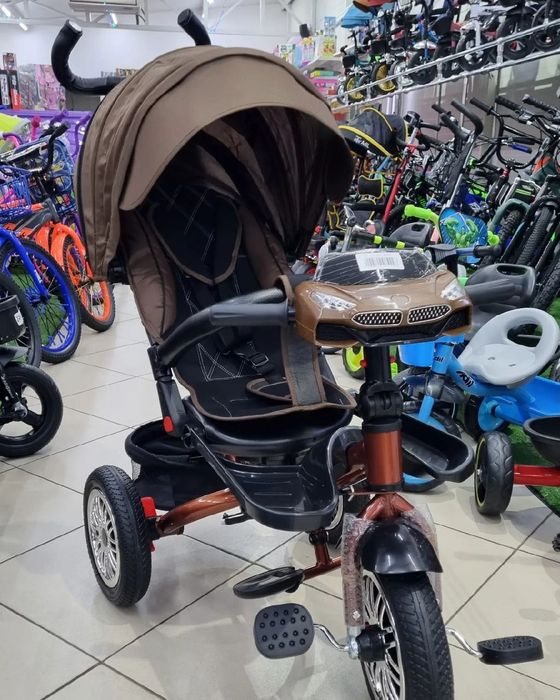 Прогулочная коляска велосипед