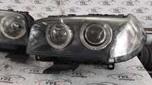 Far stanga-dreapta cu xenon Bmw X3 an 2008