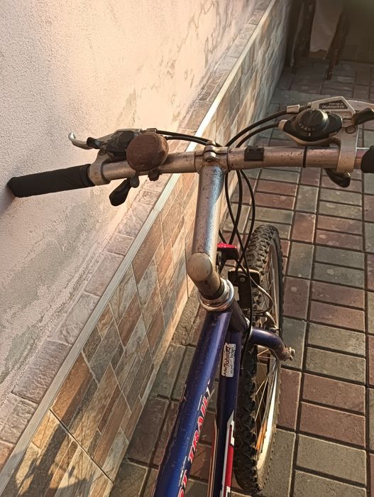 Vând bicicleta GT