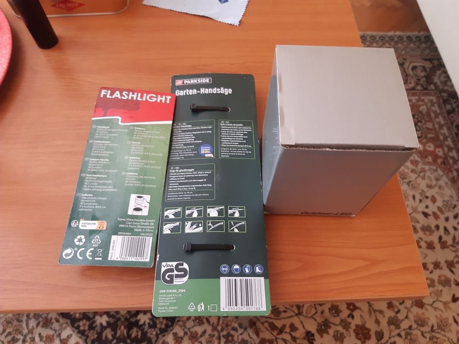 Два броя  фенери и трион  за рязане на  клони.