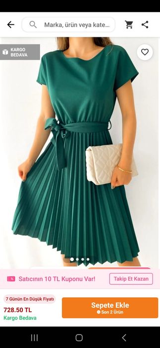 Новое турецкое зеленое платье ниже колен.