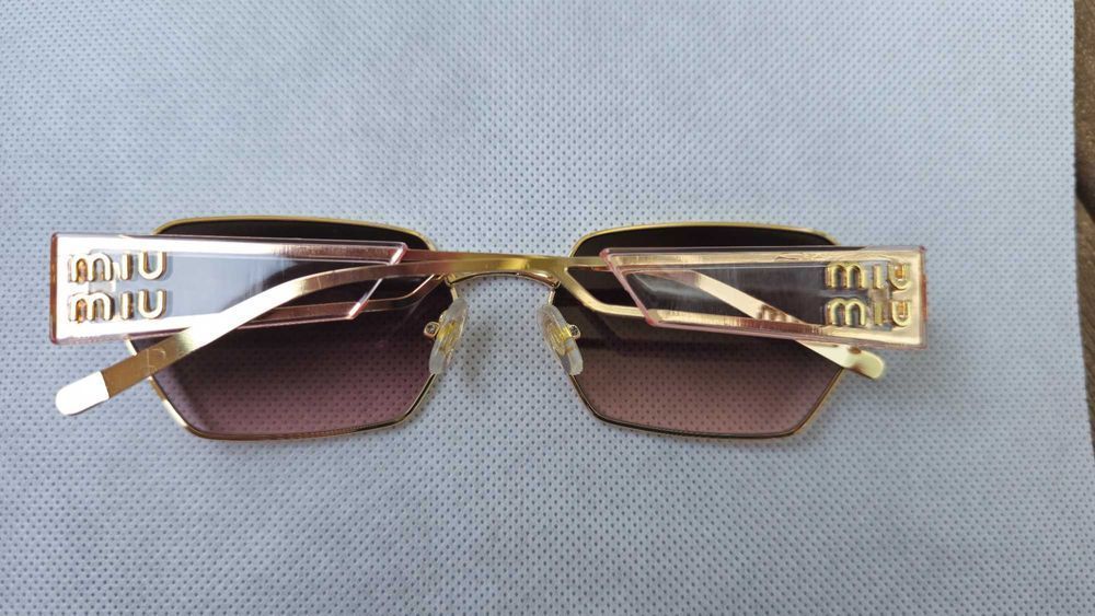 Ochelari de soare Miu Miu lentila maro, rama aurie, brat transparent