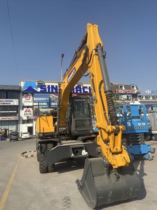 sinomach 215W. колёсный экскаватор