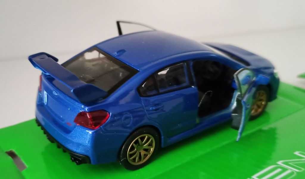 Macheta Subaru WRX STi albastru - Welly 1/36