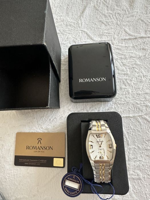 Часы швейцарский марки Romanson