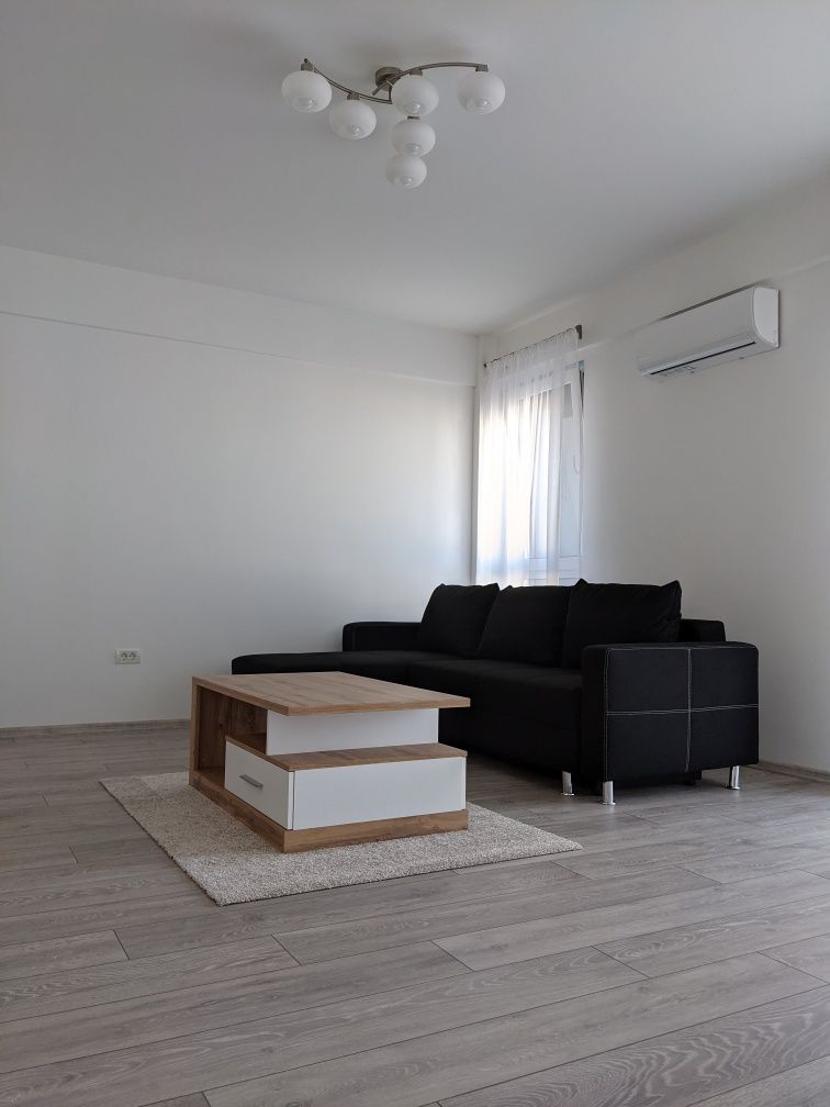 Inchiriez apartament cu 2 camere  și parcare subterana