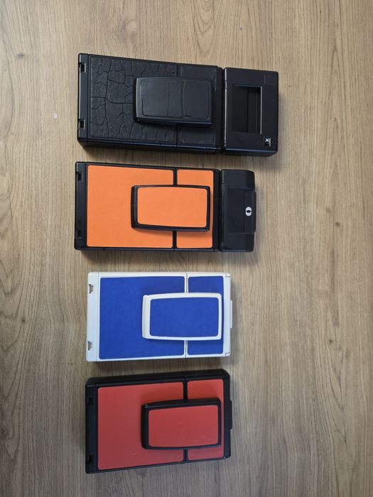 Camere pliabile polaroid SLR680 și SX-70