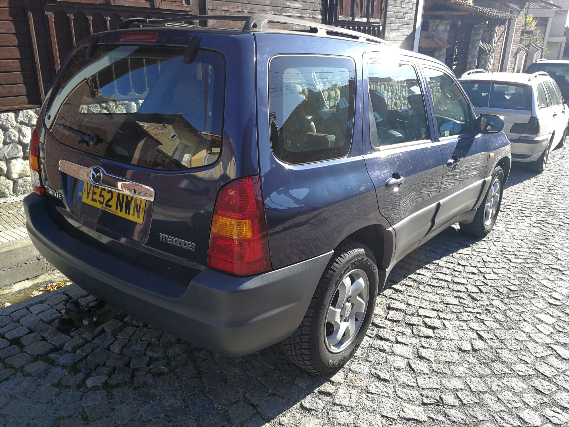 на части Mazda Tribute 2.0