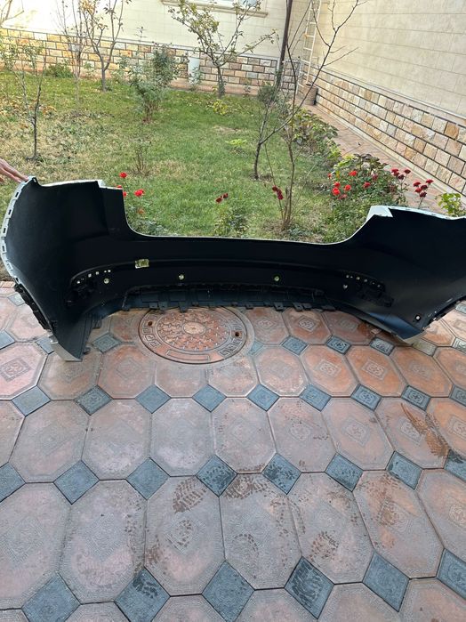 Продам новый задний бампер на L7.