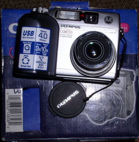 Olympus C4000 6,5-19,5мм F2.8 CCD 1/1,8 4,13 Mp