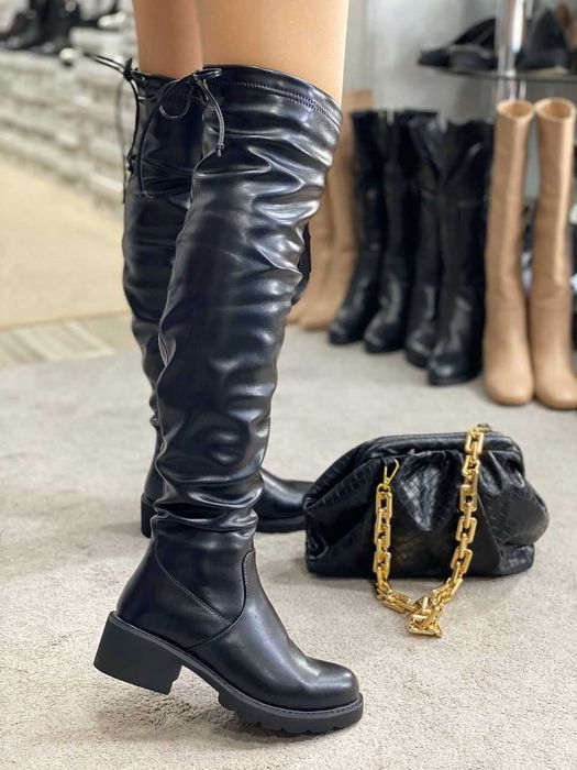 Продам  новые ботфорты.