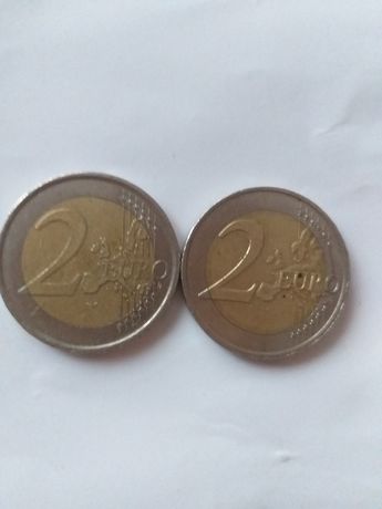Vand 2 monede de 2 € anul 2014 2003 nu fac schimb pret 2000