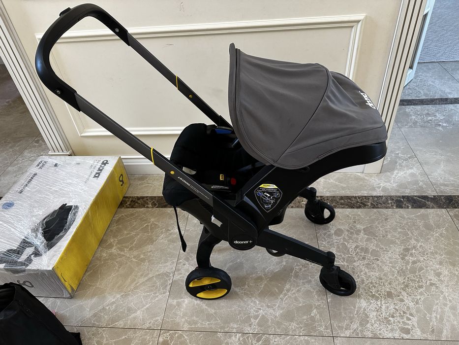 Коляска Doona + база isofix doona