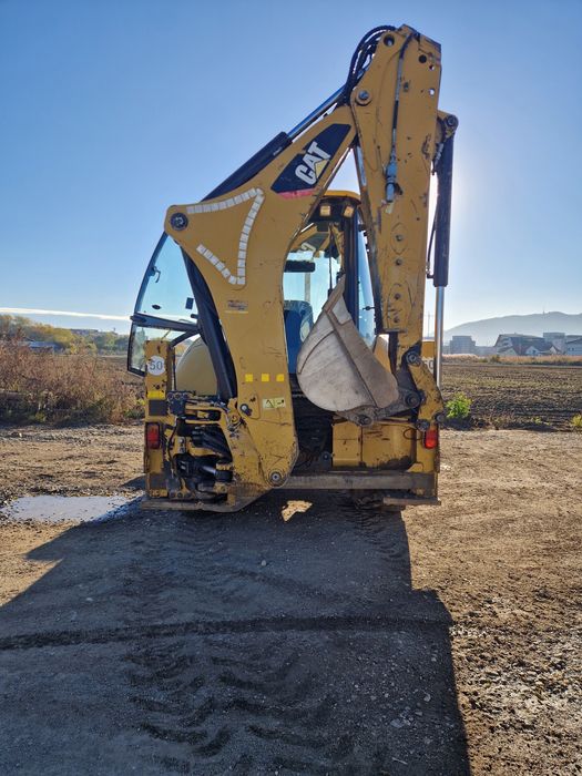 Vand buldoexcavator  cat caterpillar 428F fara ad blue