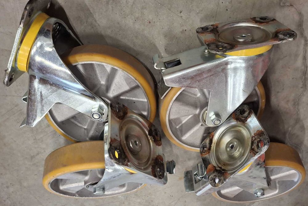 Vand 4 roti pivotante ptr. sarcini grele,cu frana,diam. 200mm