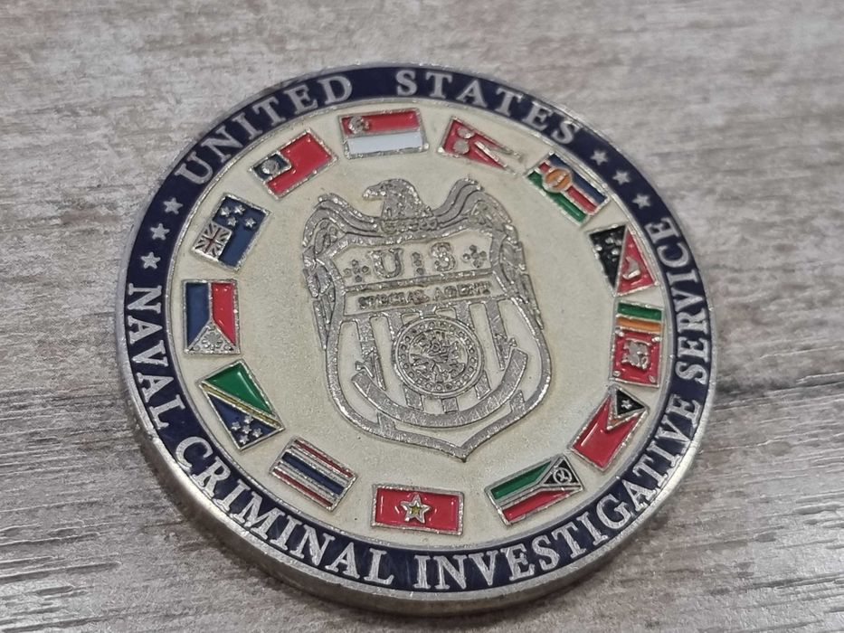 Монета NCIS Singapore