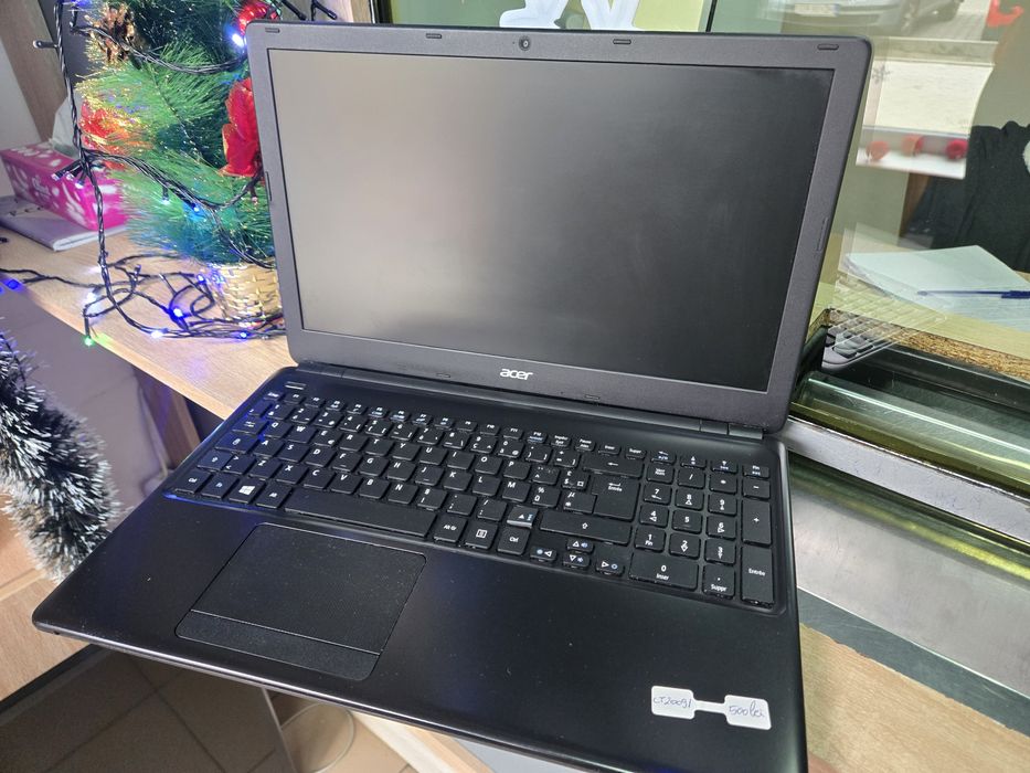Vand laptop Acer E1-510
