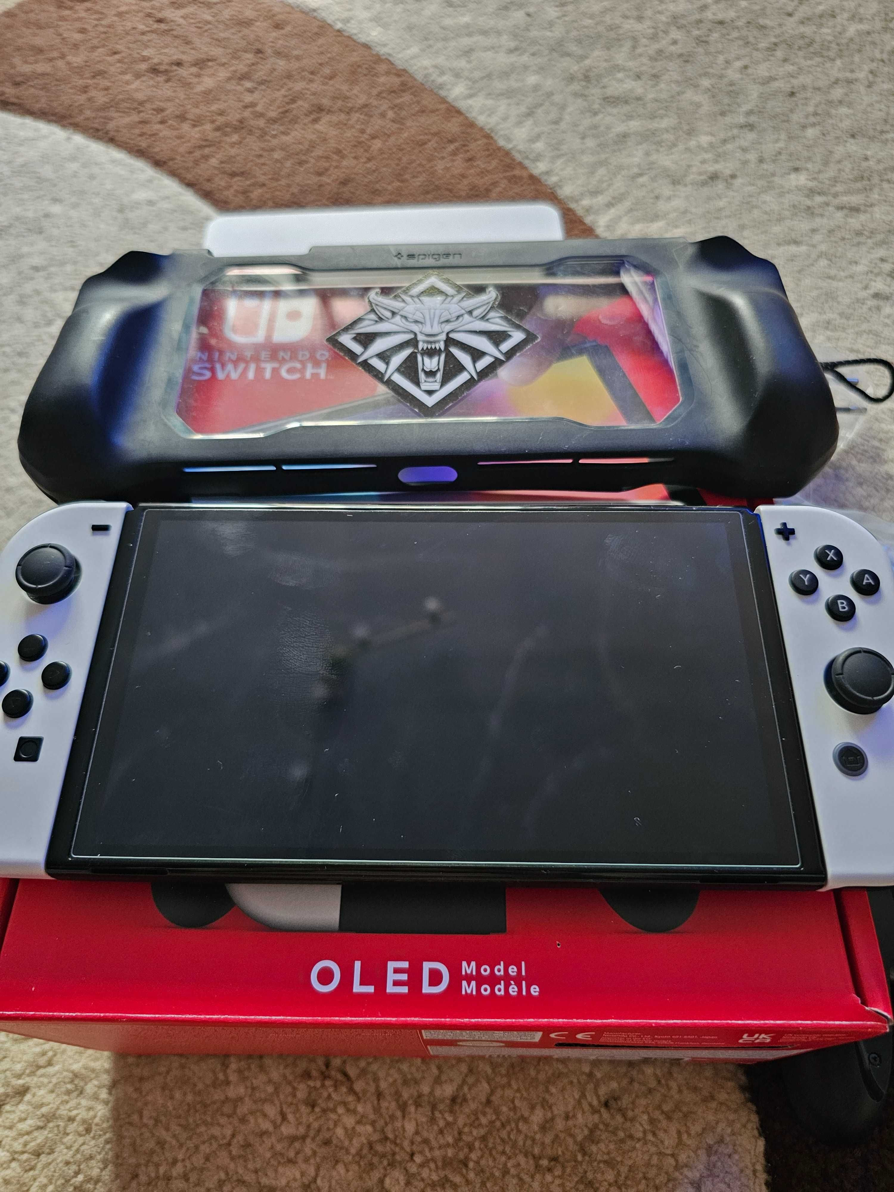 Nintendo switch oled + grip spigen