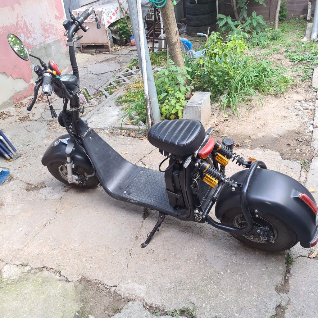 vand scuter electric