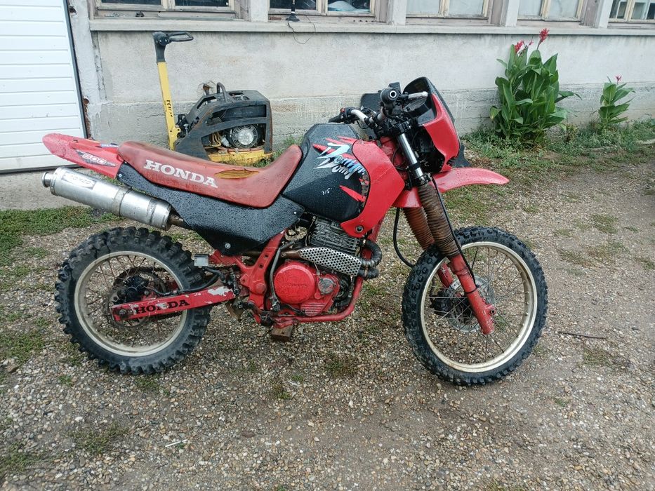 Vand Honda Dominator NX  sau Schimb