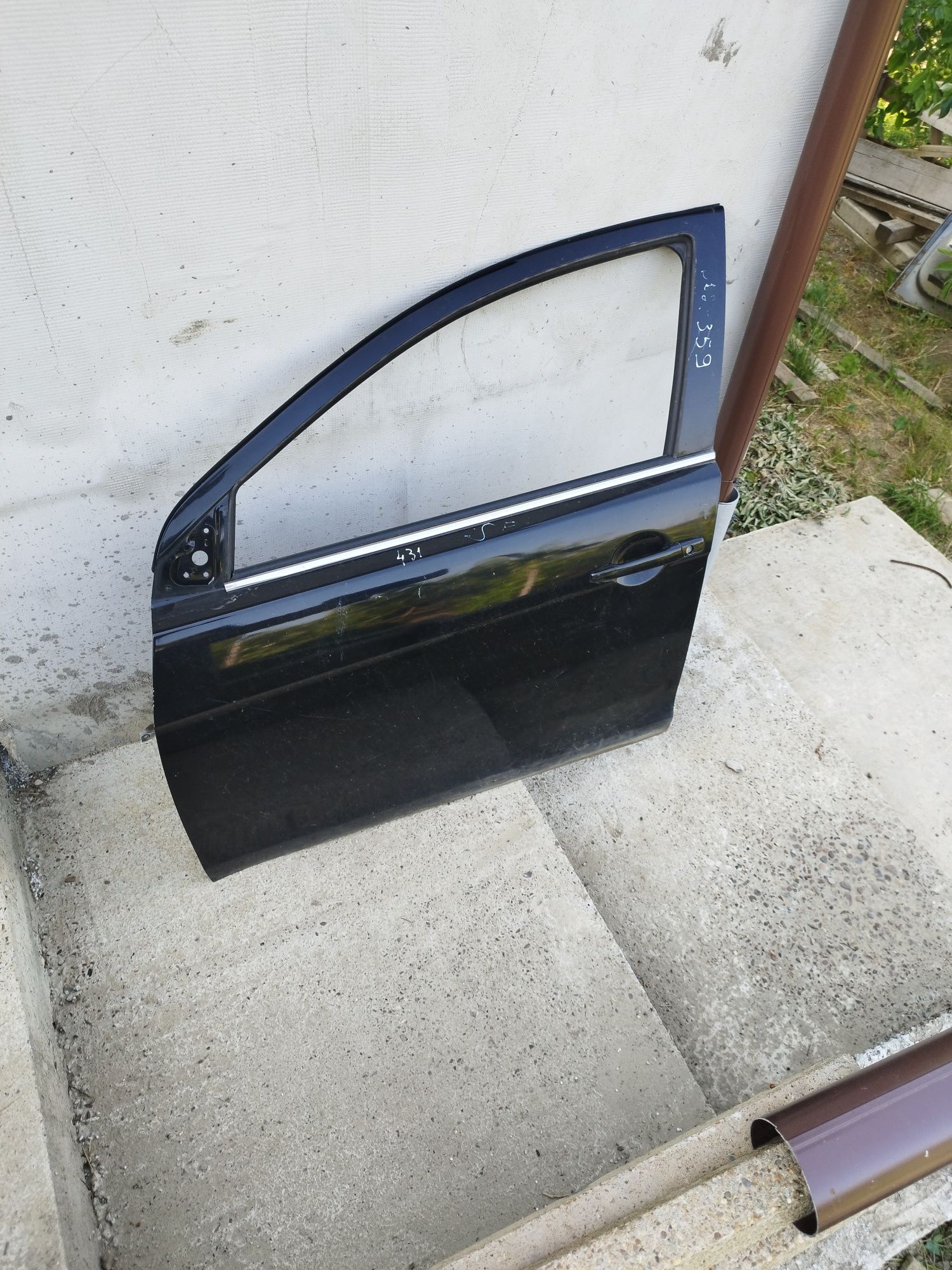 Portiera stânga față Mitsubishi lancer 2009