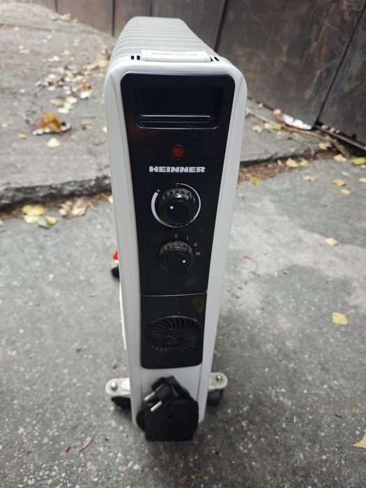Calorifer electric cu ulei Heinner, 220v, 2900w,12 elemenți,functional
