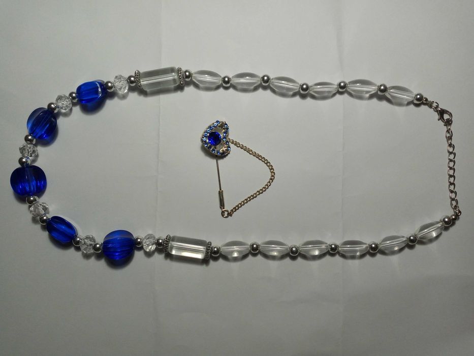 Украшение ожерелье, серьги и брошь.Цена 80 тыс за все