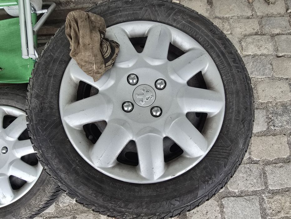 Зимни гуми с джанти и тасове 185/65/R15 за Пежо и Ситроен