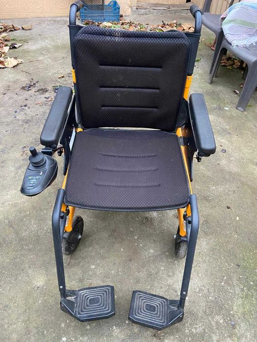 cărucior electric pentru persoane cu dizabilități