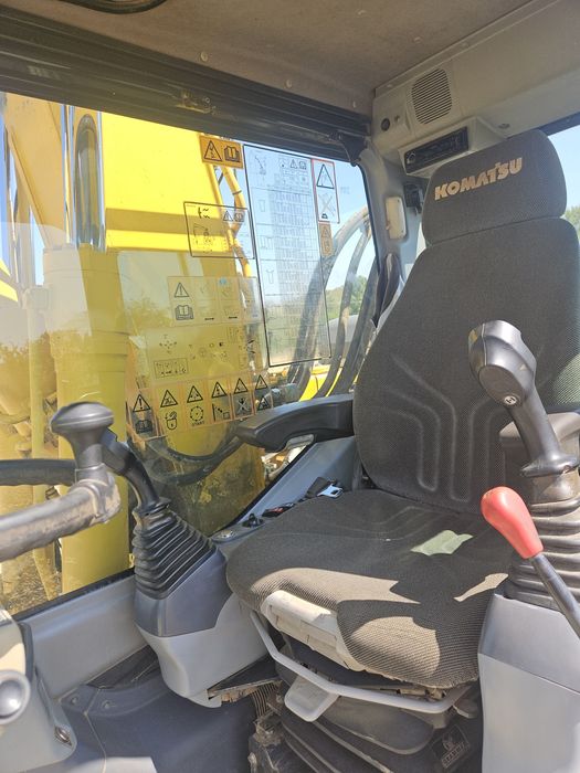 Excavator pe roți komatsu pw 180