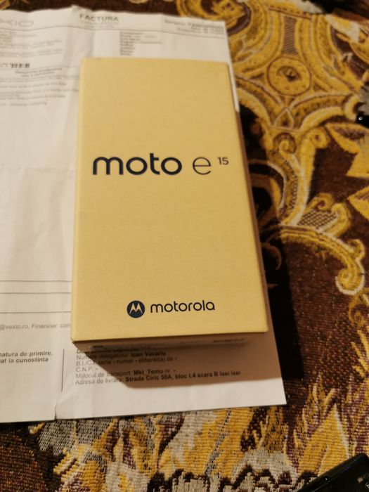Motorola E15 sigilat cumparatoru desigileaza