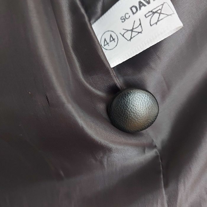 Haina fina din piele mănușa