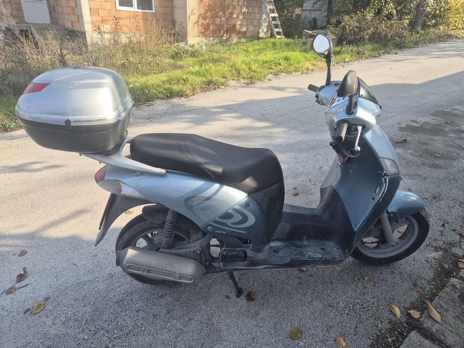 Suzuki burgman 400 Honda nes 125