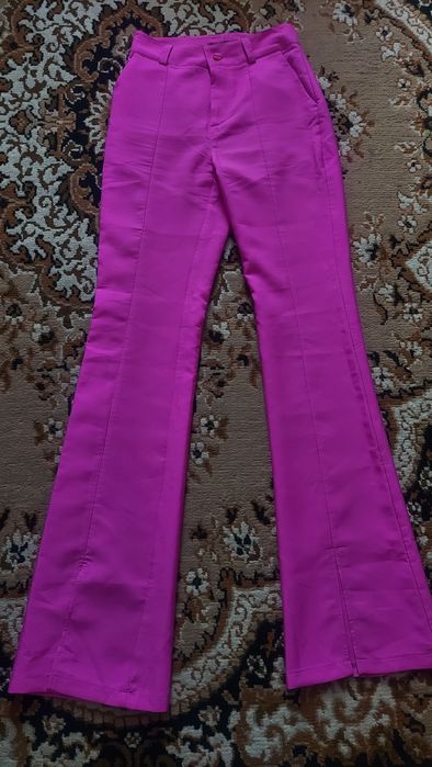 Продам брюки новые