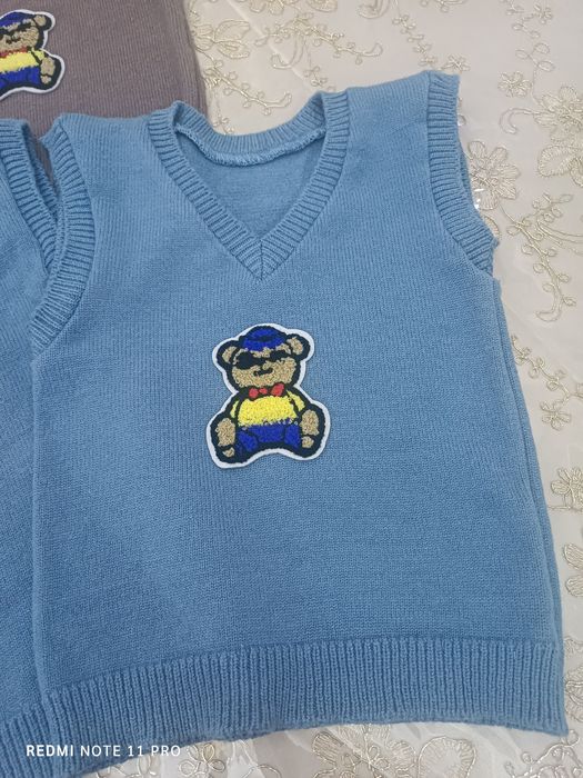 Вязанные безрукавки