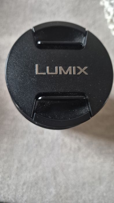 Vând  obiectiv Panasonic 12-60