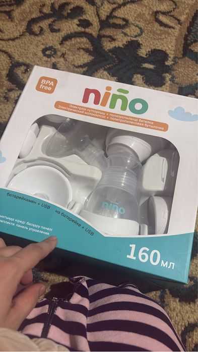 Электрический молокоотсос