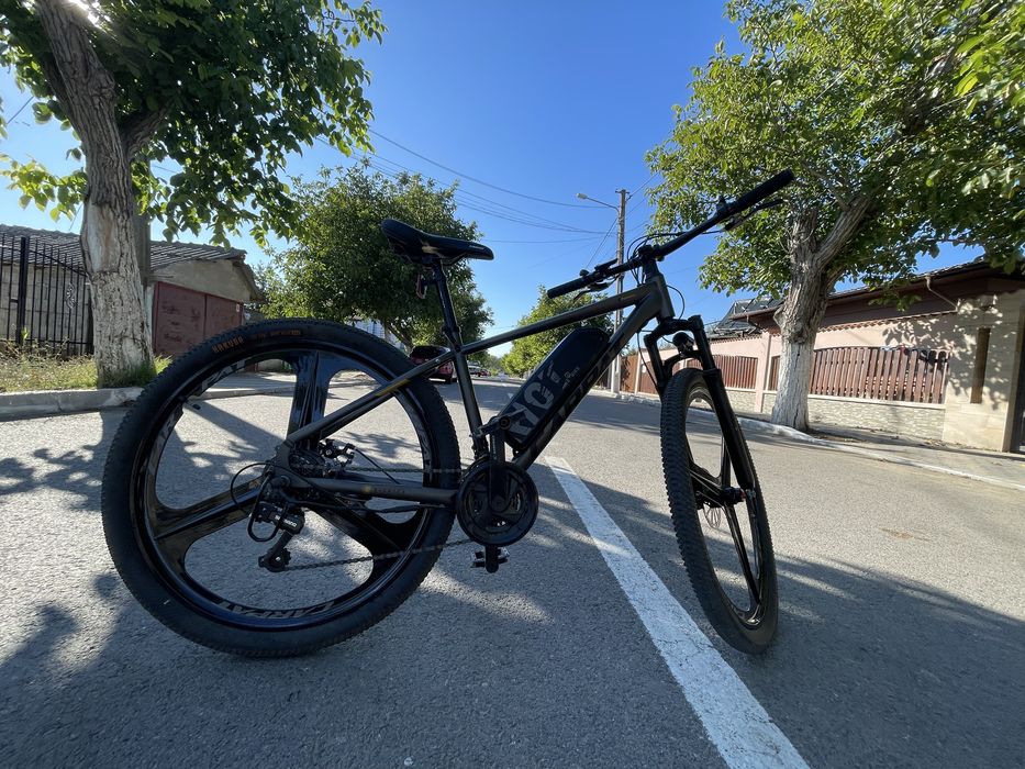 Bicicletă electrică MTB Asistată Electric